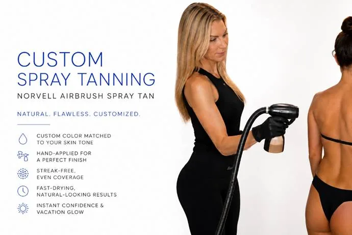 Custom airbrush spray tan artist applying an even, personalized tan